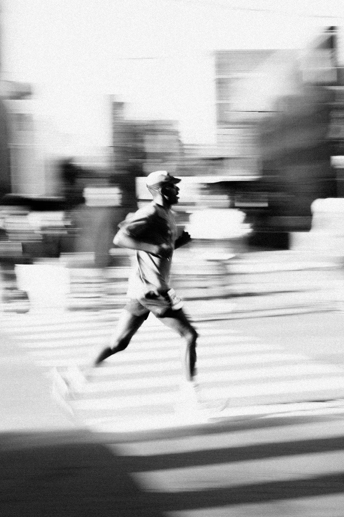 Runner crossing a street