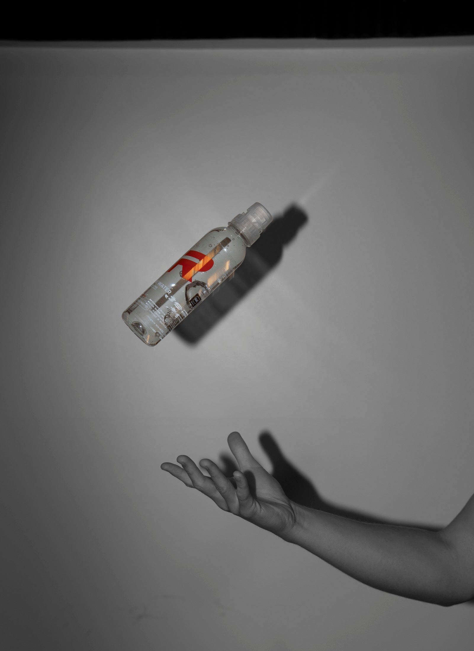 Creset bottle tossed in the air